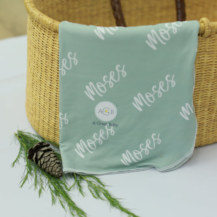 simple name custom blanket with mint green background and name used as the only design element