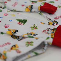 Construction Christmas Pajamas customized with boy's name.