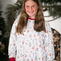 Teen girl wearing Modern Nutcracker Holiday Pajamas for women, modern minimalistic images from the Nutcracker ballet on white knit fabric and red cuffs, matching Christmas jammies for families.