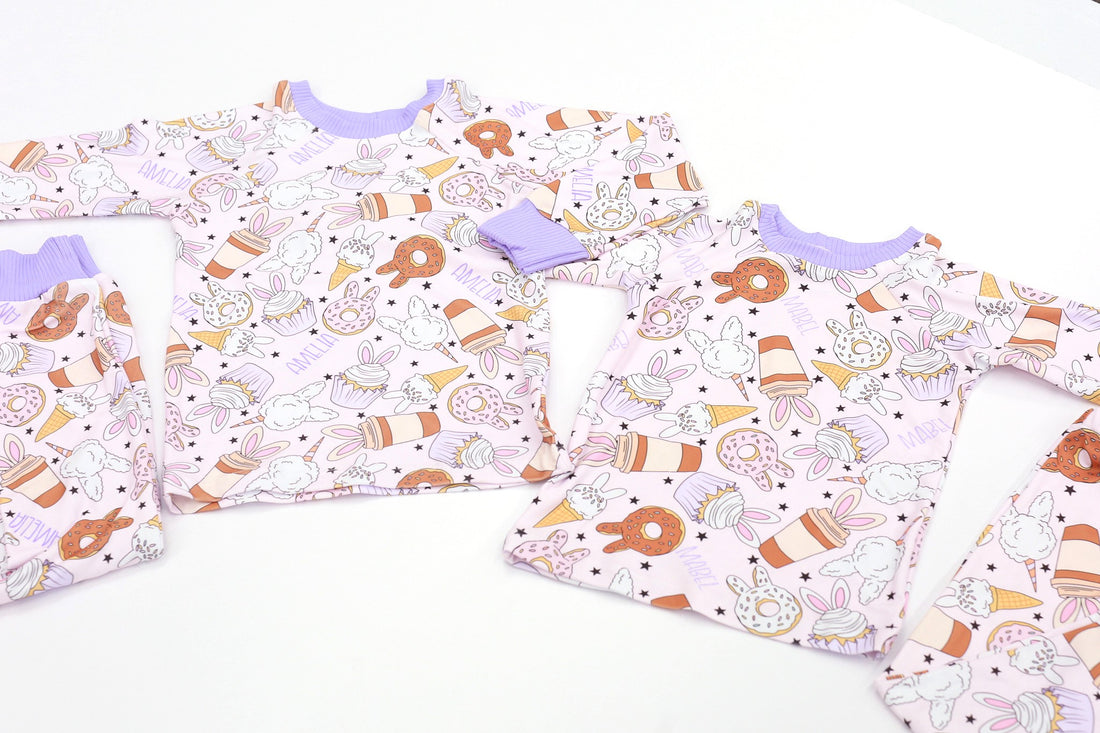 cute easter sleepwear for kids, girl Easter pajamas with bunny shaped sweet treats on a lavender stretchy background.
