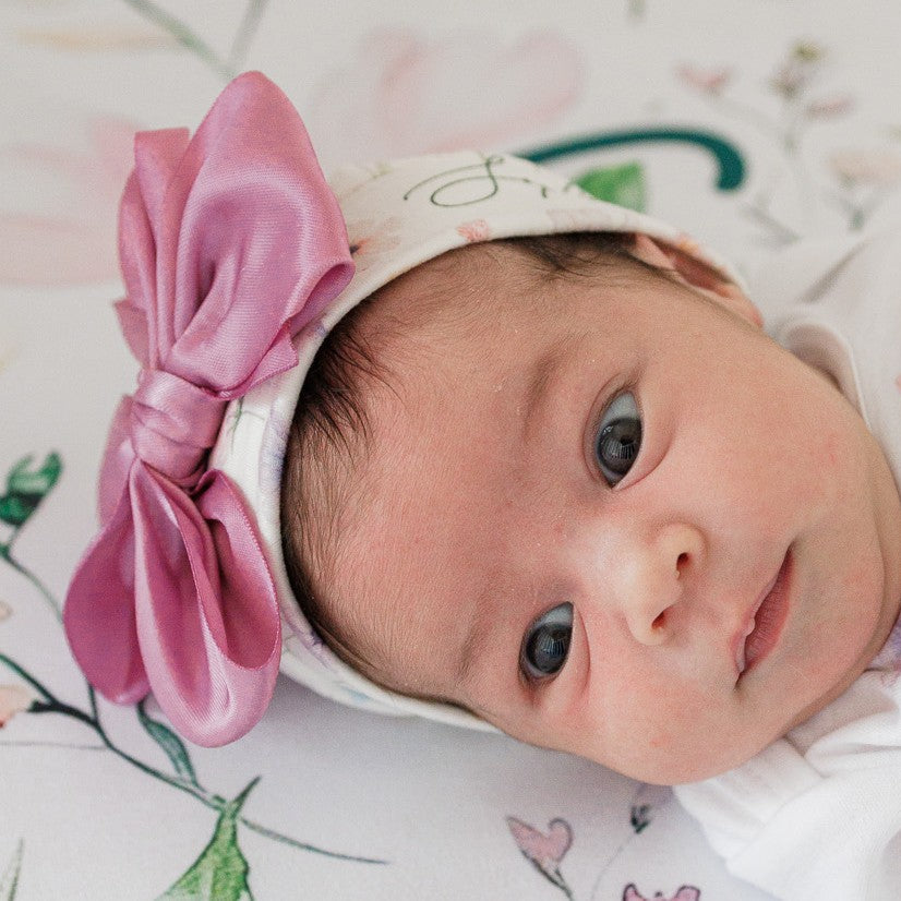 Personalized newborn outfit set with Wildflowers floral design and satin bow hat