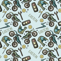 The design on our dirt bike pajamas that includes dirt bikes, dirt bike helmets, smiley faces, and stop lights.