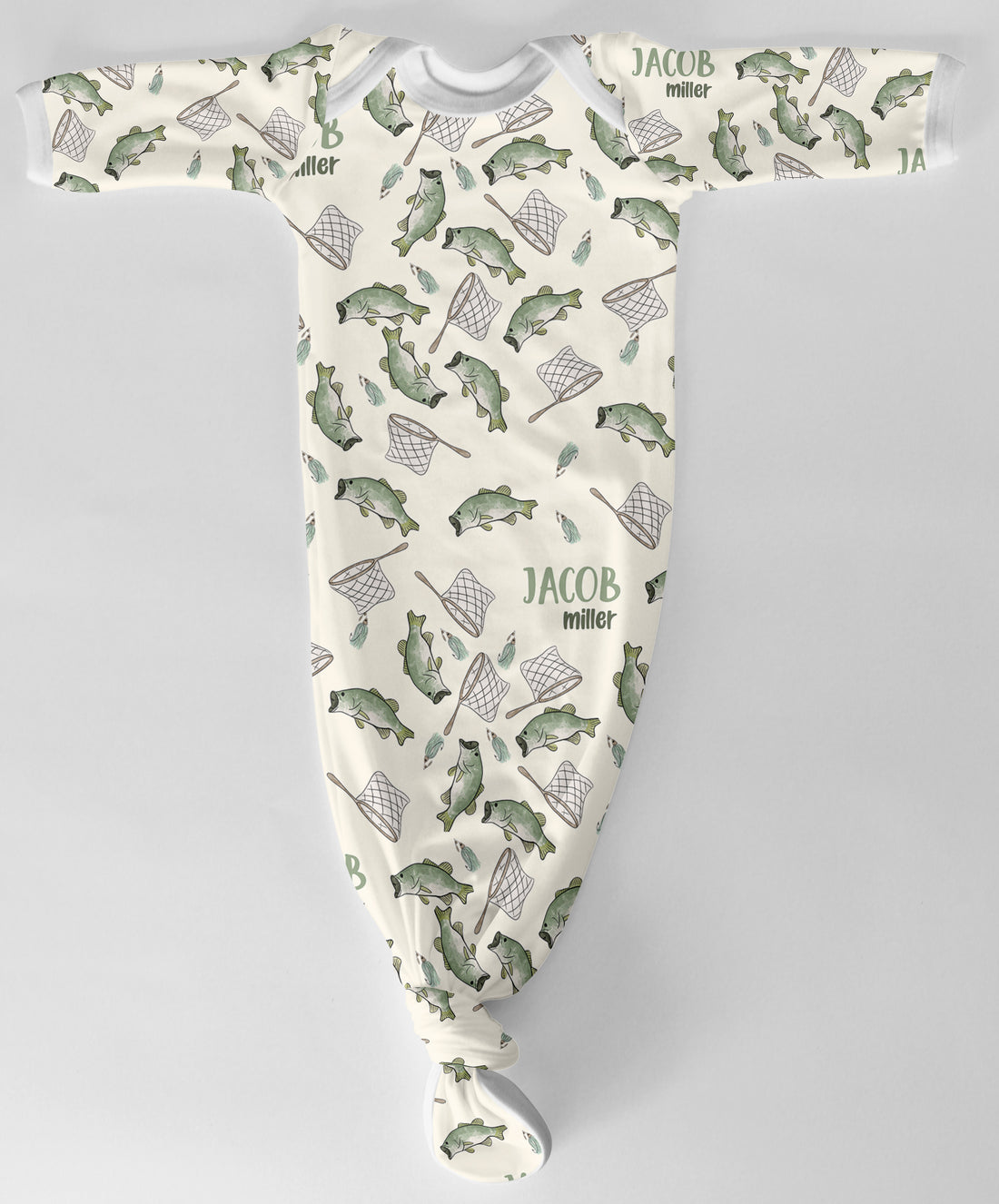 Baby onesie with fish and fishing rod pattern on a ivory background