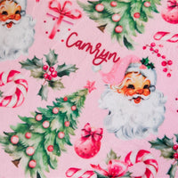 Close up photo of our Adult Pink Santa Pajamas.