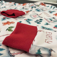 Design on Christmas hot chocolate pajamas.