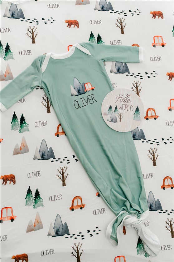 The Great Outdoors Baby Infant Gown Tie bottom gown that is personalized. Sage Green Baby Gown with name, mountains, trees, bear.