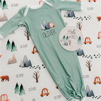 The Great Outdoors Baby Infant Gown Tie bottom gown that is personalized. Sage Green Baby Gown with name, mountains, trees, bear.