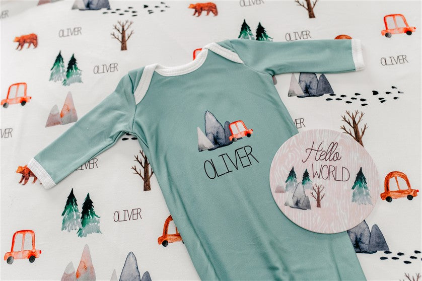 The Great Outdoors Baby Infant Gown Tie bottom gown that is personalized. Sage Green Baby Gown with name, mountains, trees, bear.