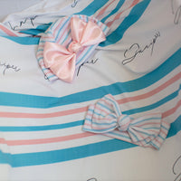 Stretchy hospital swaddle with matching hat and headband