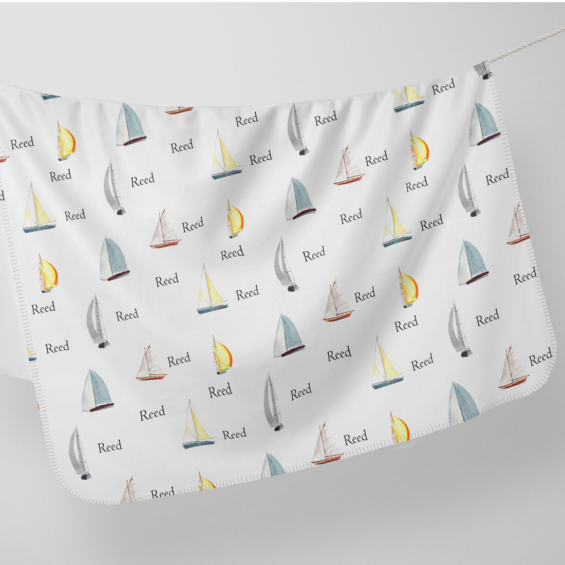 The luxury design on our stretchy sailboat swaddle.