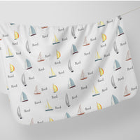 The luxury design on our stretchy sailboat swaddle.