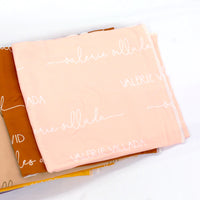 Camden Pale Peach Stretchy Swaddle
