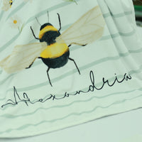 bumblebee blanket for babies, personalized stroller blanket with baby's name and bumblee print on striped background