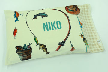 minky pillowcase for little boys personalized with his name, and fishing themed images, edged with beige checkered print.