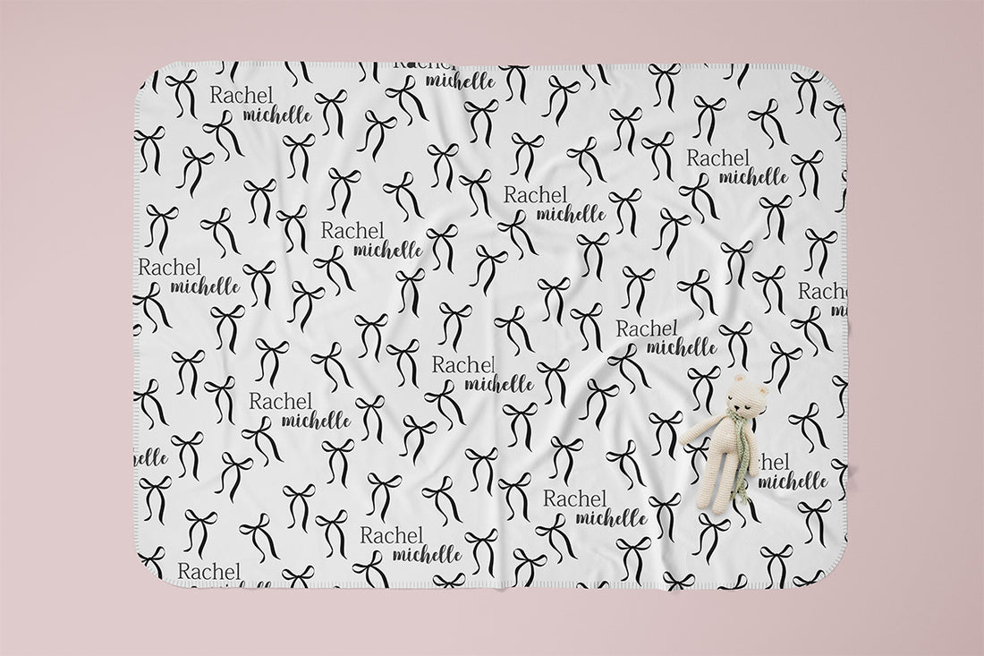 Personalized Baby Swaddle | Soft Stretchy Newborn Swaddling Wrap with Black Bows
