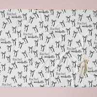 Personalized Baby Swaddle | Soft Stretchy Newborn Swaddling Wrap with Black Bows