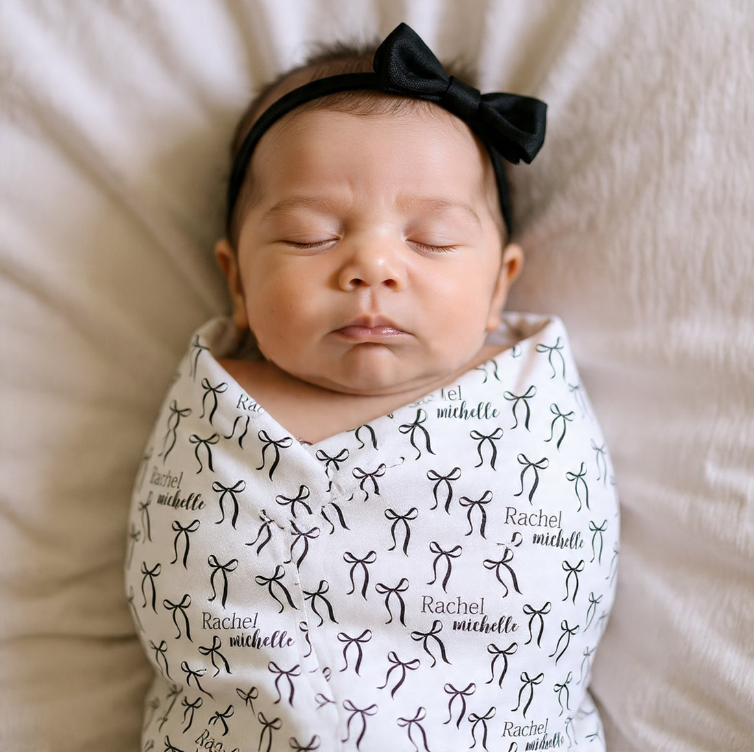 Personalized Baby Swaddle | Soft Stretchy Newborn Swaddling Wrap with Black Bows