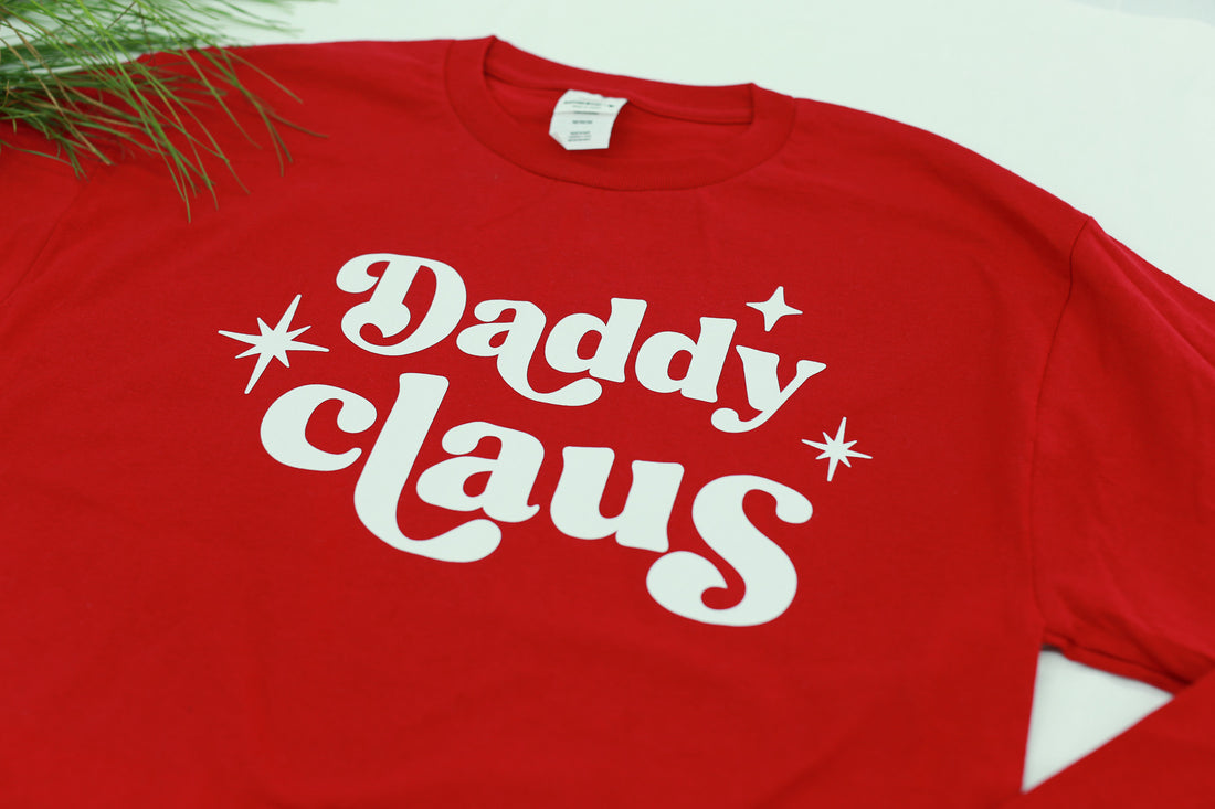 Daddy clause Christmas pajama shirt to match striped Christmas pajamas. 