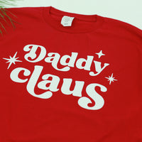 Daddy clause Christmas pajama shirt to match striped Christmas pajamas. 