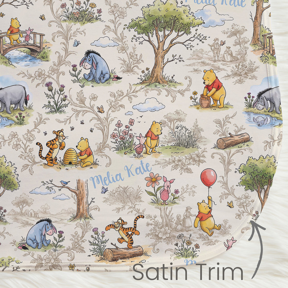 The image is a repeating pattern of illustrations from the Winnie the Pooh series, including Eeyore, Tigger, Tigger's friends, and other beloved characters. The pattern features various scenes and elements from the story, such as the characters, animals, and natural surroundings. The text "Melia Kate" is visible, likely indicating the artist or designer responsible for the pattern. The image is described as a "Satin Trim" and is a part of a larger collection of illustrations.
