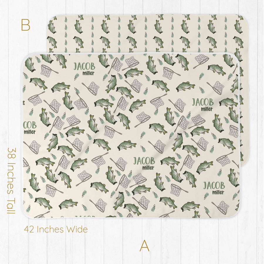 Two placemats with fishing-themed pattern and baby's name on a white background.